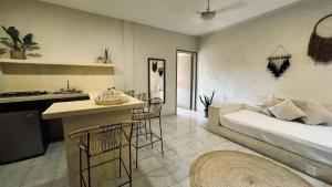 Postel nebo postele na pokoji v ubytování Hotel Noah Tulum