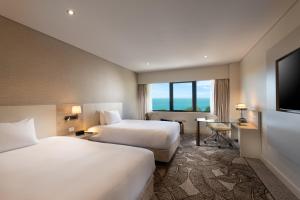 Vuode tai vuoteita majoituspaikassa Hilton Darwin