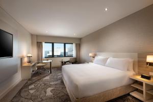 Vuode tai vuoteita majoituspaikassa Hilton Darwin
