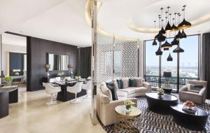 a rendering of a living room and dining room at Fairmont Riyadh in Riyadh