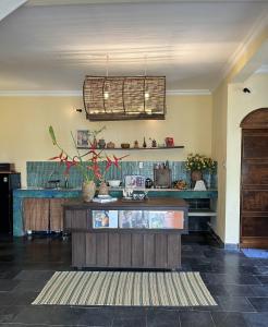 a kitchen with a counter in a room at Pao Homes - Riverside House in Hoi An