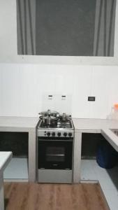 Cucina o angolo cottura di MAMA MARU POSADA - wifi y cocina compartida, baño privado Jr Junin barrio norte 263 Piura