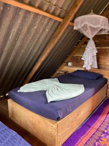 מיטה או מיטות בחדר ב-Backpackers Hostel