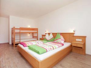Katil atau katil-katil dalam bilik di Spacious Villa with Sauna in Mittersill