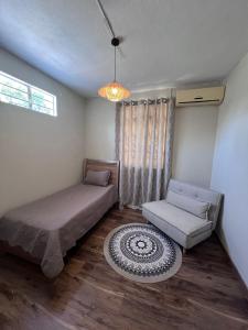 Postel nebo postele na pokoji v ubytování Albion Beachfront Villa + 14 fotografií