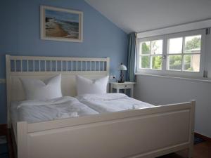 Ένα ή περισσότερα κρεβάτια σε δωμάτιο στο Tamme Comfortable holiday residence