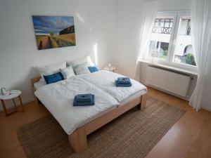 Ένα ή περισσότερα κρεβάτια σε δωμάτιο στο Am Park Comfortable holiday residence