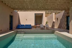 Πισίνα στο ή κοντά στο Homatinos Villa, a SeaView Sanctuary with 2 Pools, By ThinkVilla