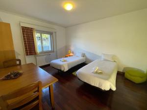 Cama ou camas em um quarto em HI Bragança – Pousada de Juventude