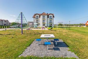 Herní místnost nebo prostor pro děti v ubytování Domki i pokoje Angelo z sauną i jacuzzi- Karwia