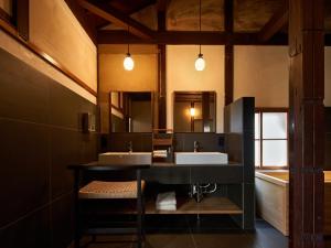 Una cama o camas en una habitación de 京の宿　石原