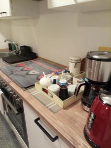a kitchen counter with a coffee maker on it at Apartment Veronika in Vandoies
