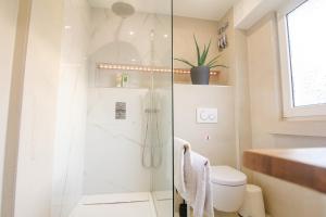 Koupelna v ubytování Shiny Singapore Room - Homestay - Doppelzimmer mit Gemeinschaftsbad + 17 fotografií