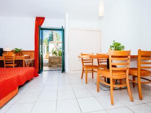 a dining room with a table and chairs at Holiday resort Zaton Holiday Resort Zaton-Nin - CDN02044-CYB in Zaton