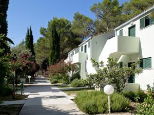 a walkway in front of a building at Holiday resort Zaton Holiday Resort Zaton-Nin - CDN02044-CYB in Zaton