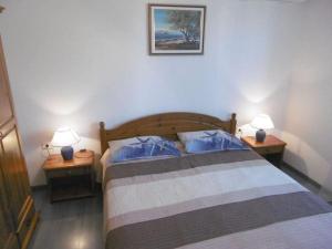 Ένα ή περισσότερα κρεβάτια σε δωμάτιο στο Emma Comfortable holiday residence +12 φωτογραφίες