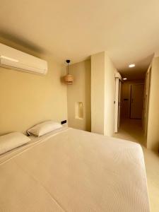 Postel nebo postele na pokoji v ubytování Doc's Hotel Kemer + 37 fotografií