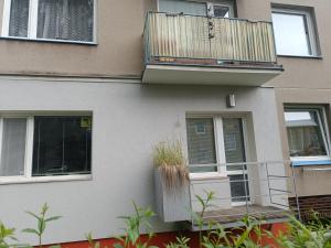 a apartment building with a balcony and a porch at MASNA APARTMENT LIBEREC in Liberec