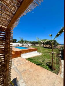 a view of a swimming pool from a house at Villa Santo Stefano in Monopoli