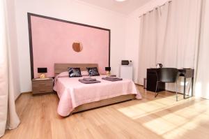 Postel nebo postele na pokoji v ubytování Pink Room