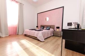 Postel nebo postele na pokoji v ubytování Pink Room