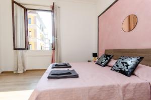 Postel nebo postele na pokoji v ubytování Pink Room