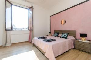 Postel nebo postele na pokoji v ubytování Pink Room