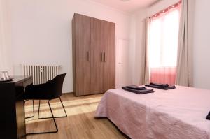 Postel nebo postele na pokoji v ubytování Pink Room