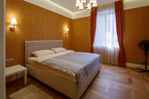 Кровать или кровати в номере Villa Lido apartments
