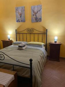 Postel nebo postele na pokoji v ubytování Tuscany Location