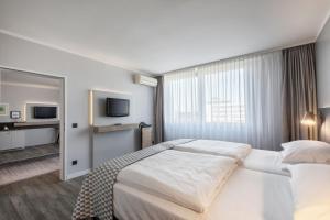 Postel nebo postele na pokoji v ubytování Holiday Inn Düsseldorf-Neuss by IHG