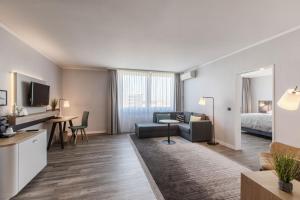 TV a/nebo společenská místnost v ubytování Holiday Inn Düsseldorf-Neuss by IHG