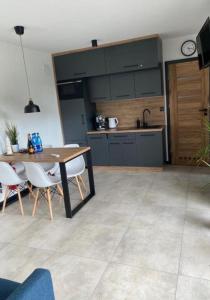 Kuchyňa alebo kuchynka v ubytovaní CISZA Bungalows Village / Blisko Natury