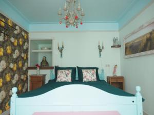 Postel nebo postele na pokoji v ubytování B&B Bureau Warmoesstraat