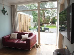 Posezení v ubytování B&B Bureau Warmoesstraat