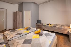 Voodi või voodid majutusasutuse Hotel & SPA centrum PALMIRA toas