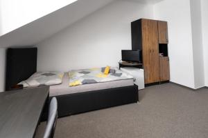 Voodi või voodid majutusasutuse Hotel & SPA centrum PALMIRA toas