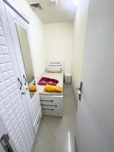 Posteľ alebo postele v izbe v ubytovaní Premier Serviced Males Hostel