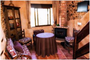 A seating area at Casa Rural El Corralino