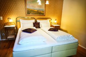 Katil atau katil-katil dalam bilik di Penta Apartments