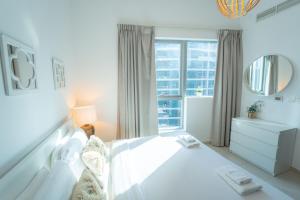 Fotografie z fotogalerie ubytování AWS Holiday Homes - Prime Apartment near the Beach v Dubaji