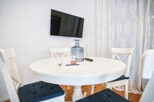 Televisyen dan/atau pusat hiburan di Penta Apartments