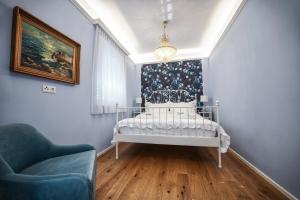 Katil atau katil-katil dalam bilik di Penta Apartments