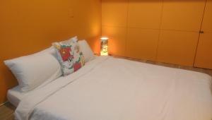 Letto o letti in una camera di PianoPiano B&B