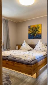 Postel nebo postele na pokoji v ubytování Ferienwohnung Olbernhau 7 Täler - Apartment