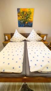 Postel nebo postele na pokoji v ubytování Ferienwohnung Olbernhau 7 Täler - Apartment