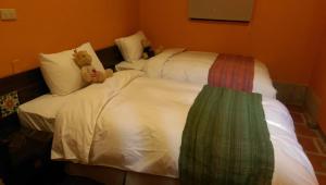 Letto o letti in una camera di PianoPiano B&B