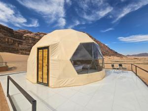 a tent on a roof in the desert at Salma Desert Camp in Disah