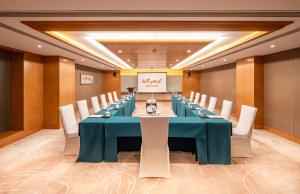 אזור העסקים ו/או חדר הישיבות ב-Wingtech Hotel