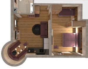 邁爾霍芬的住宿－Montana Apartments，紫色小房子的地板图